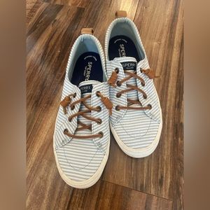 Sperry Top Sider size 7.5.  Strip light blue and white.